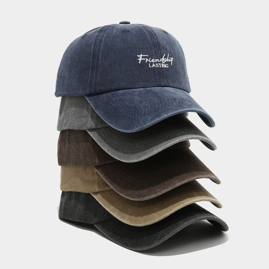 Elara Distressed Cotton Peaked Cap with English Letter Embroidery